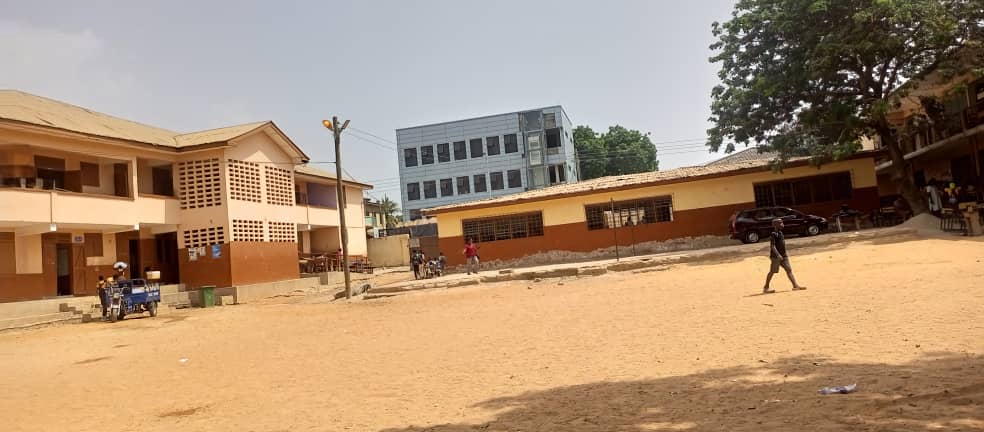 Students cleaning up to get ready for the academic team on the first day of reopening