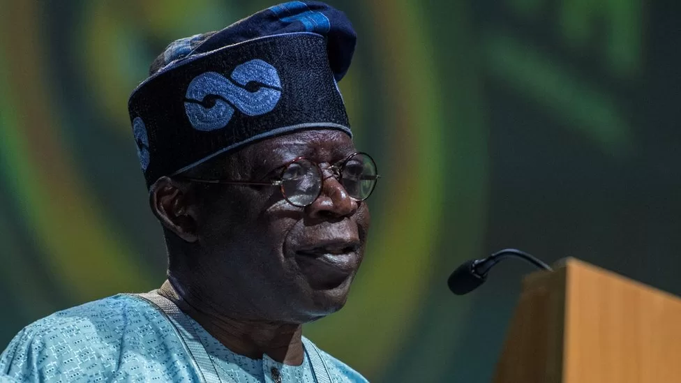 Nigeria's president offers low-income workers a temporary minimum wage increase