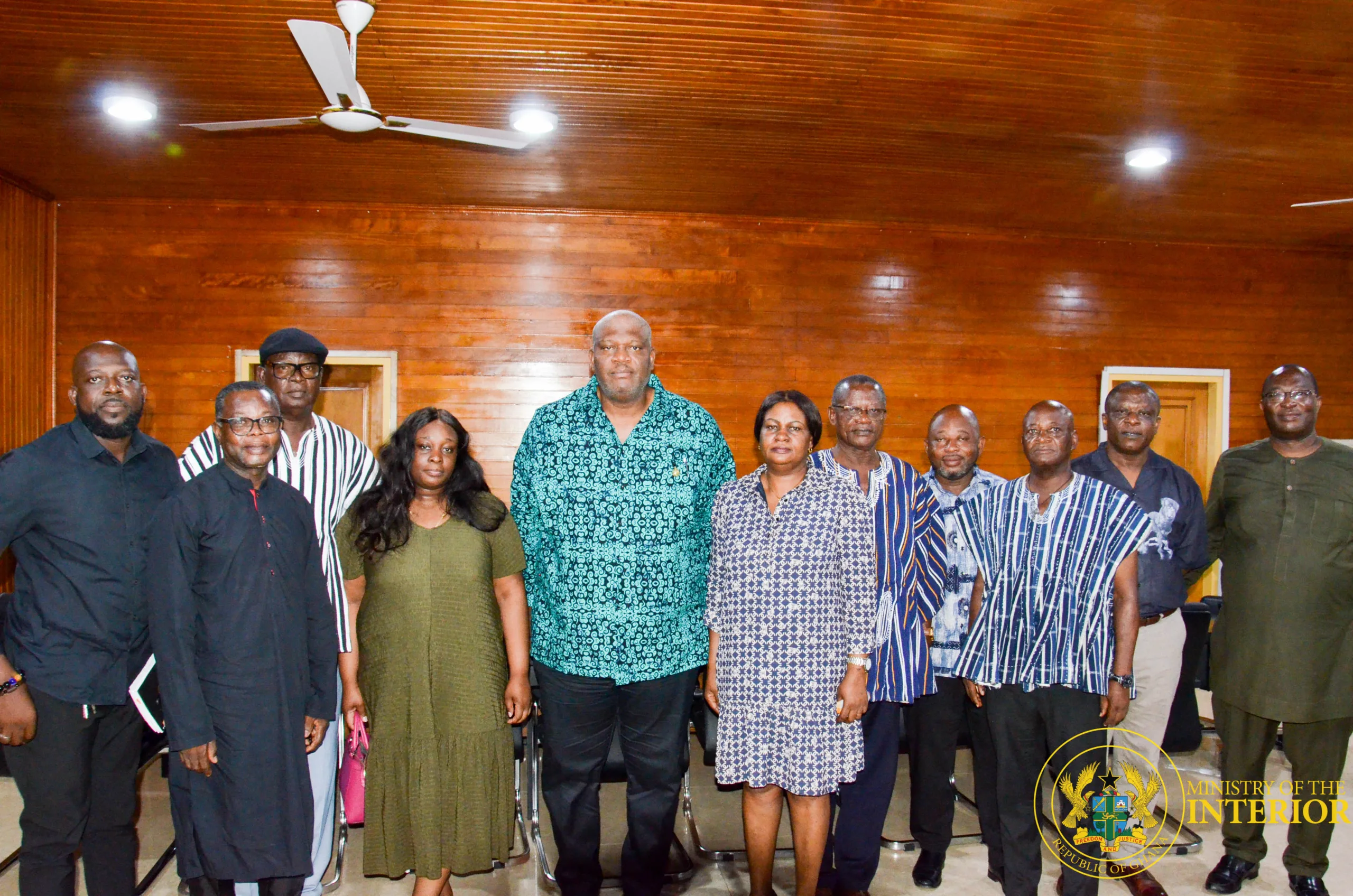 Henry Quartey consoles the Woyongo family