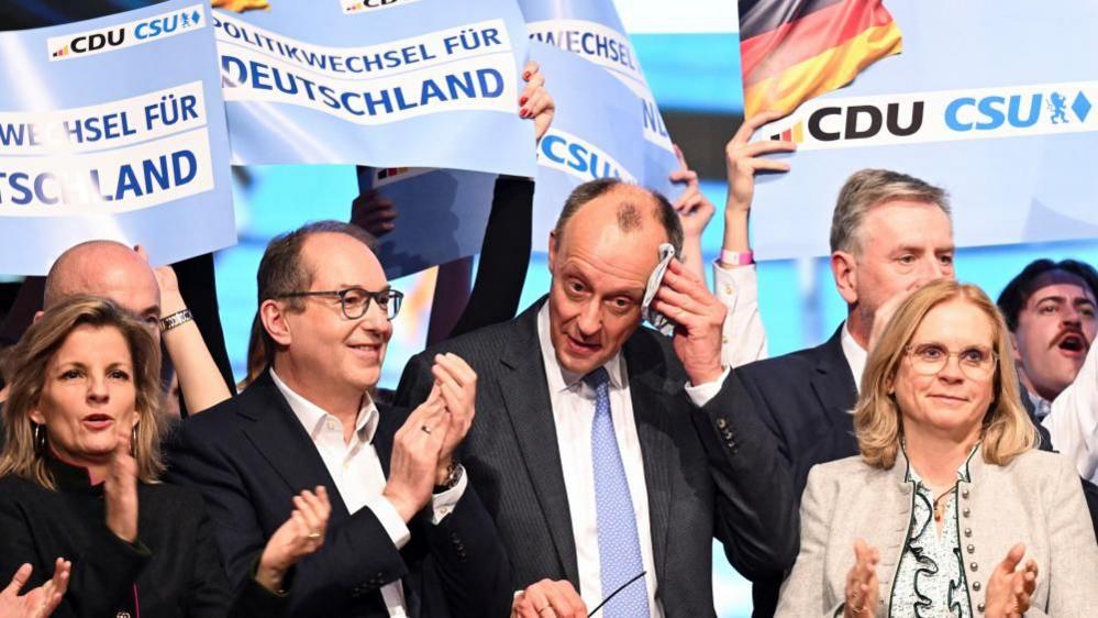 Voting begins in high-stakes German election watched closely by Europe and US