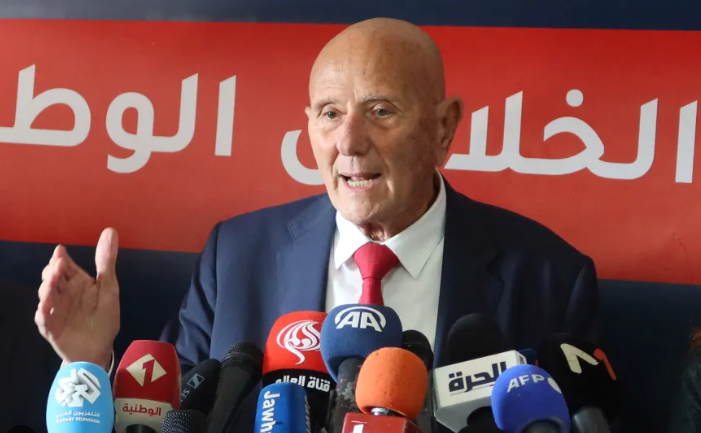 Tunisian court hands opposition figures lengthy jail terms